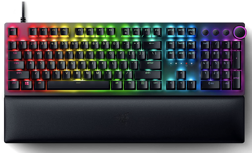 Razer Huntsman V2 product image of a black keyboard with multicoloured backlit keys featuring a wrist rest module.