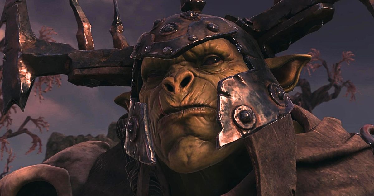 Orruk Kruleboy grimacing at the viewer in Warhammer Realms of Ruin