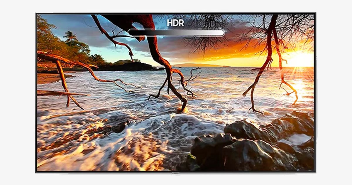 A TV marked with "HDR" is displaying the beach sunset image with High Dynamic Range.