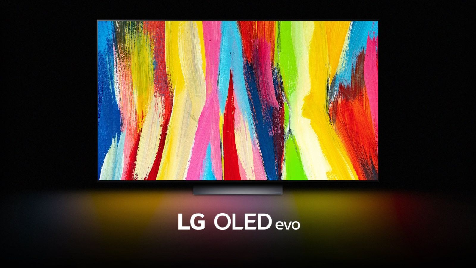Image of a large flatscreen LG TV in a dark room featuring multicoloured streaks on the display.