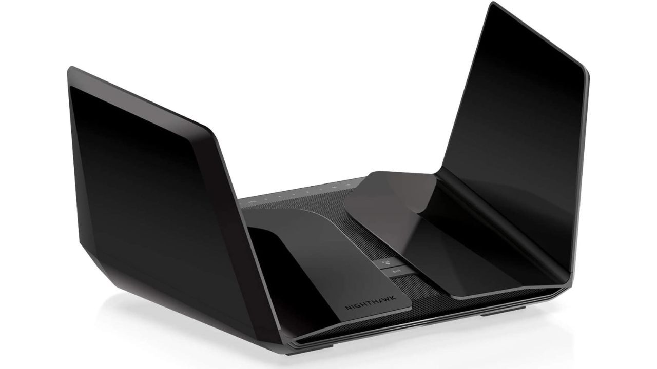 Netgear Nighthawk RAXE500 product image of a black router with two winged edges.
