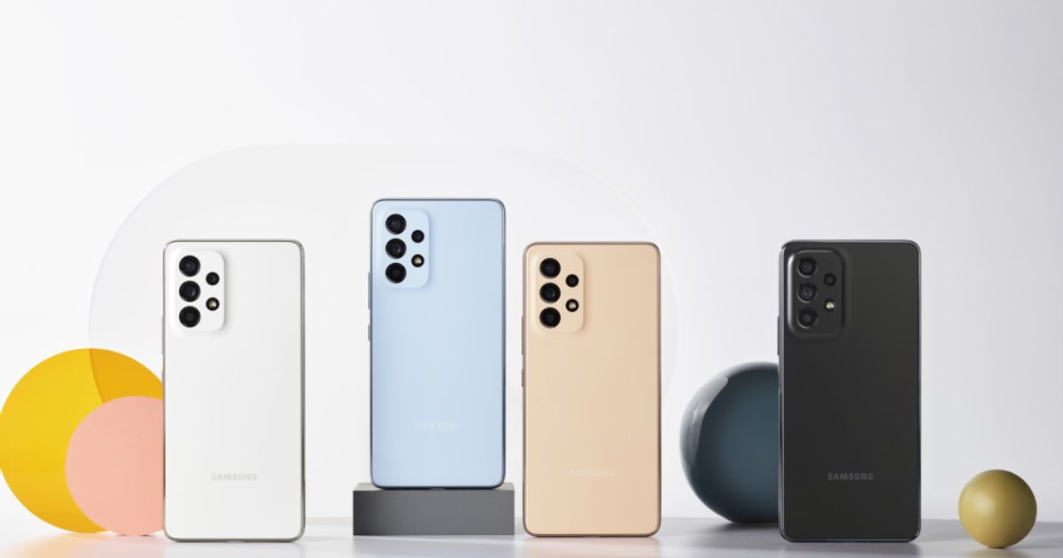 Four Samsung phones, one in white, one in blue, one in gold, and one in black.