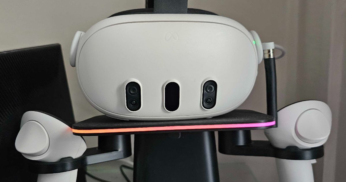 Quest 3 headset sitting on the KIWI Design RGB Vertical Stand